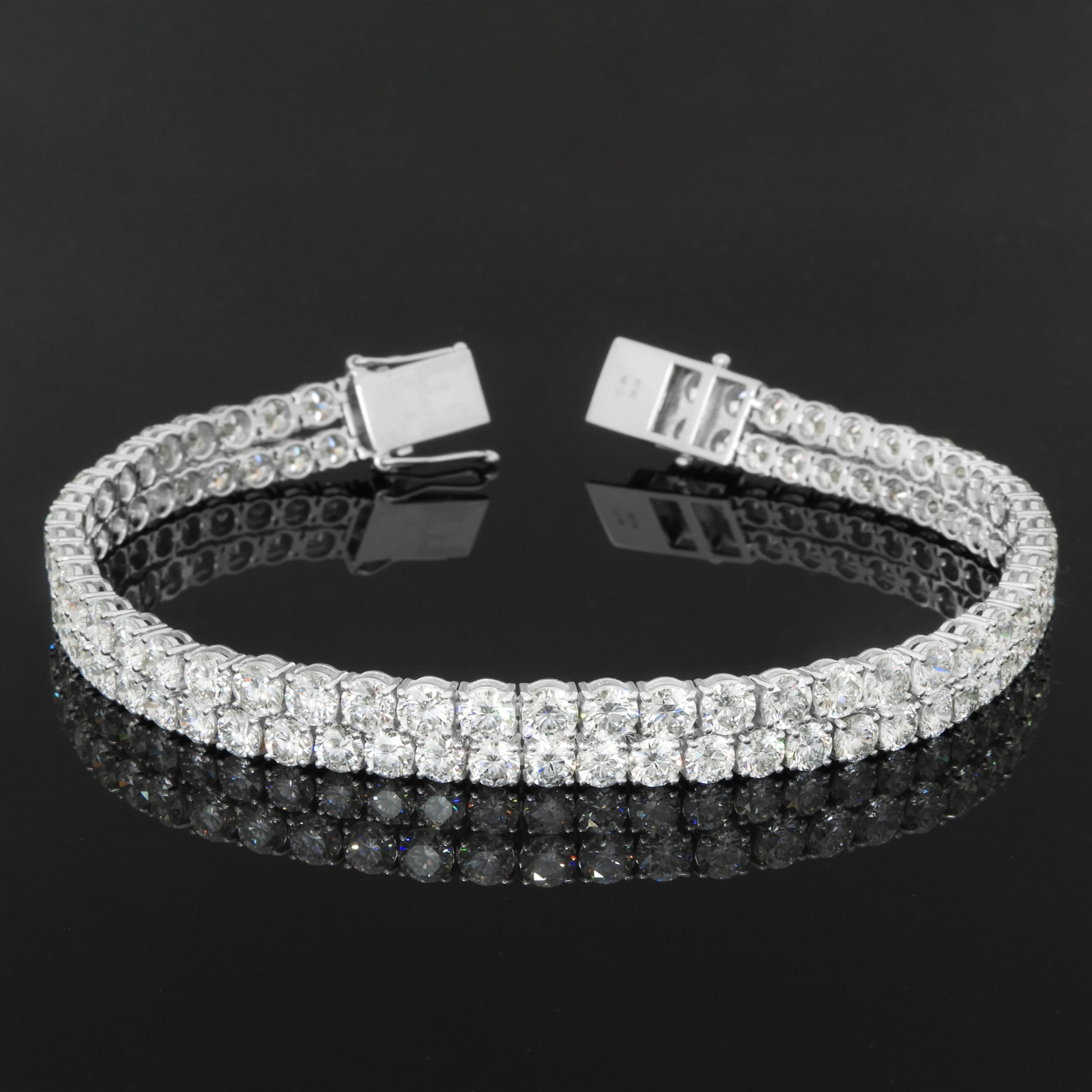 Two rows of round brilliant diamonds for a fuller, statement look, white gold.