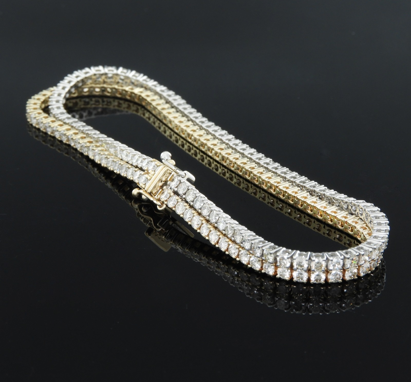The same tennis-bracelet design available in white or yellow gold.